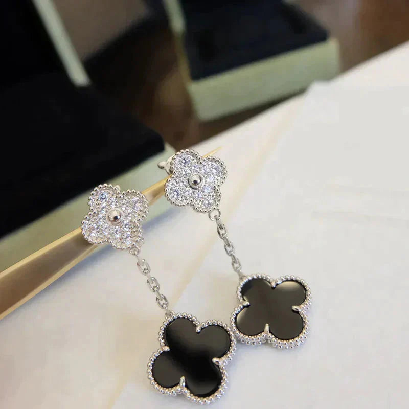 Lumi® Ohrringe mit Kleeblattmotiven, Diamant und Onyx, Silber