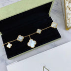 Lumi® Magisches Kleeblatt-Armband mit Moppmotiven in Gold, 5 Motive