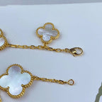 Lumi® Magisches Kleeblatt-Armband mit Moppmotiven in Gold, 5 Motive