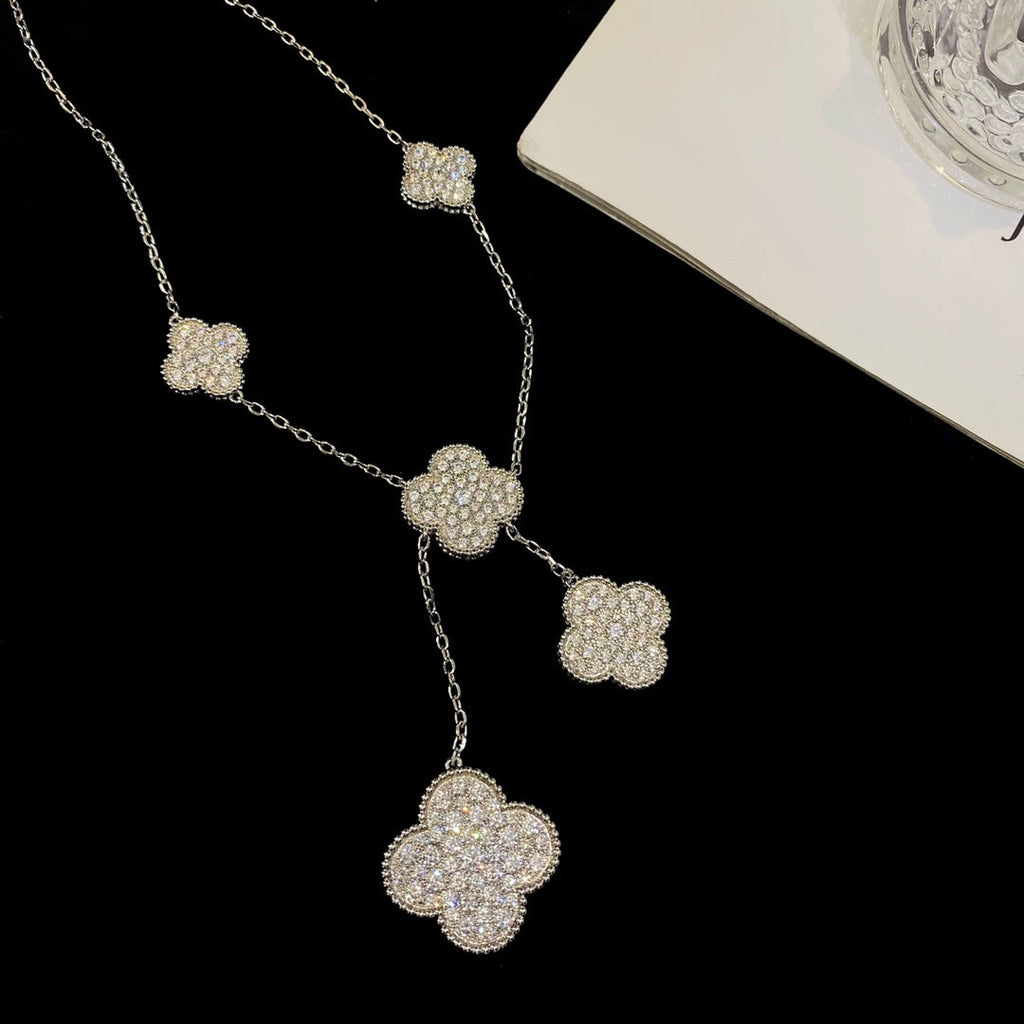 Lumi® Kleeblatt-Halskette mit 5 Motiven aus Silber und Diamanten