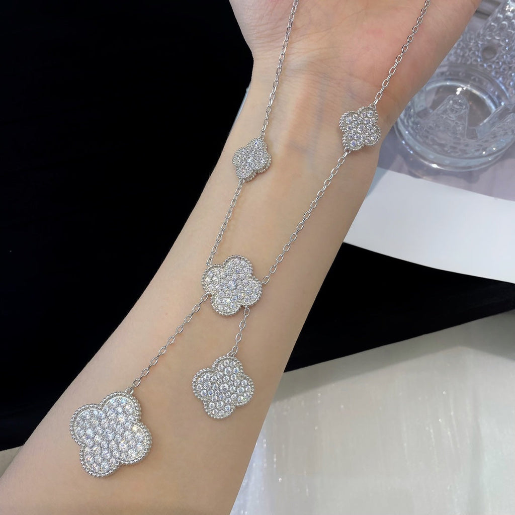 Lumi® Kleeblatt-Halskette mit 5 Motiven aus Silber und Diamanten