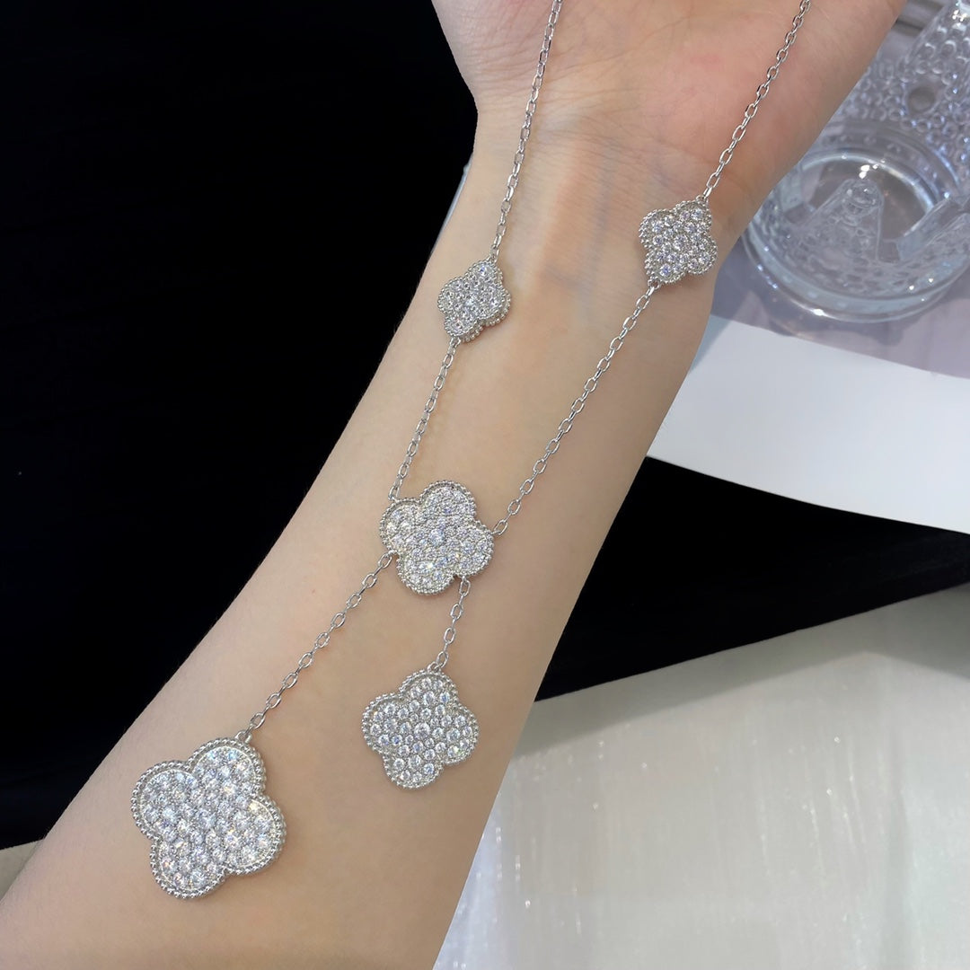 Lumi® Kleeblatt-Halskette mit 5 Motiven aus Silber und Diamanten