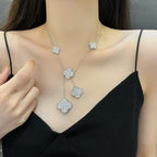 Lumi® Kleeblatt-Halskette mit 5 Motiven aus Silber und Diamanten