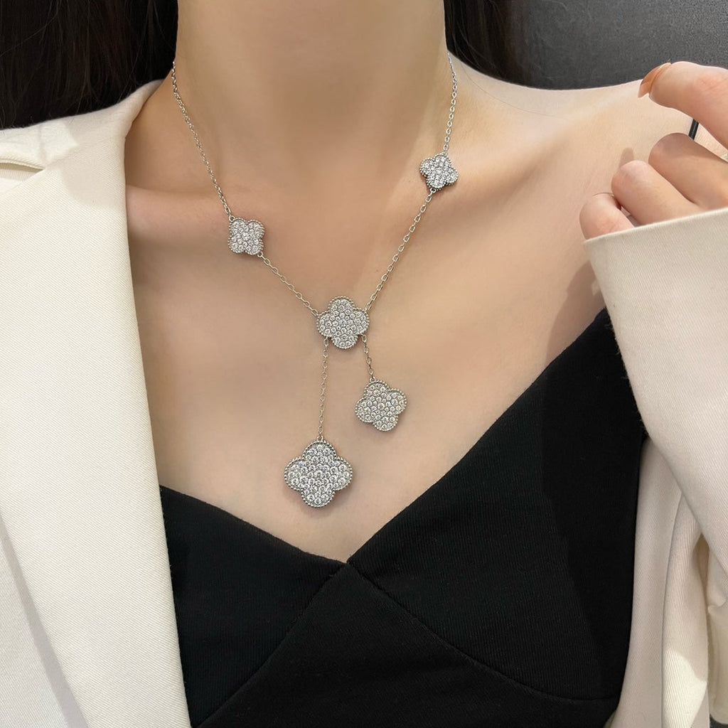 Lumi® Kleeblatt-Halskette mit 5 Motiven aus Silber und Diamanten