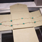 Lumi® Kleeblatt-Halskette mit 20 Motiven, Malachit und Diamanten