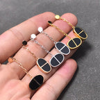 ¡®Lumi¡¯CHAINE VERSO SCHWARZE KERAMIK SILBER OHRRINGE