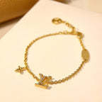 ®Lumi®LOGO STAR MOTIF GOLD ARMBAND