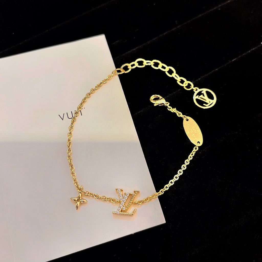 ®Lumi®LOGO STAR MOTIF GOLD ARMBAND