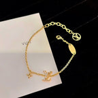 ®Lumi®LOGO STAR MOTIF GOLD ARMBAND