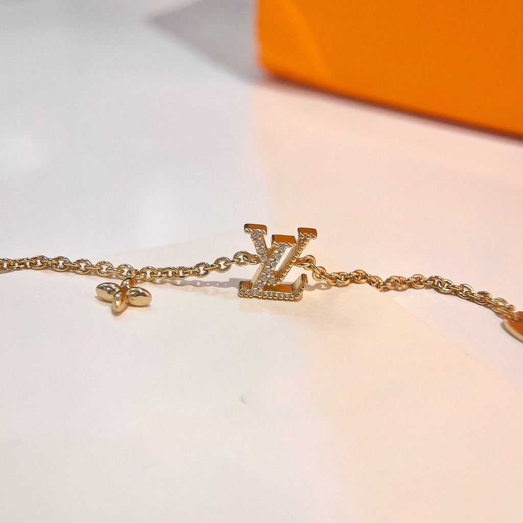 ®Lumi®LOGO STAR MOTIF GOLD ARMBAND