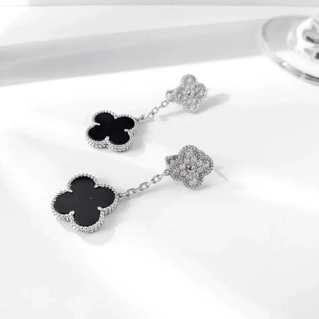 Lumi® Ohrringe mit Kleeblattmotiven, Diamant und Onyx, Silber