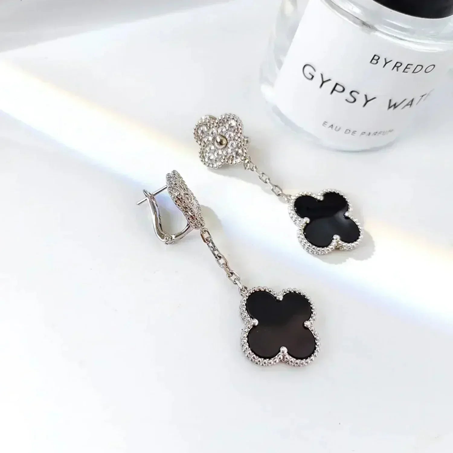 Lumi® Ohrringe mit Kleeblattmotiven, Diamant und Onyx, Silber