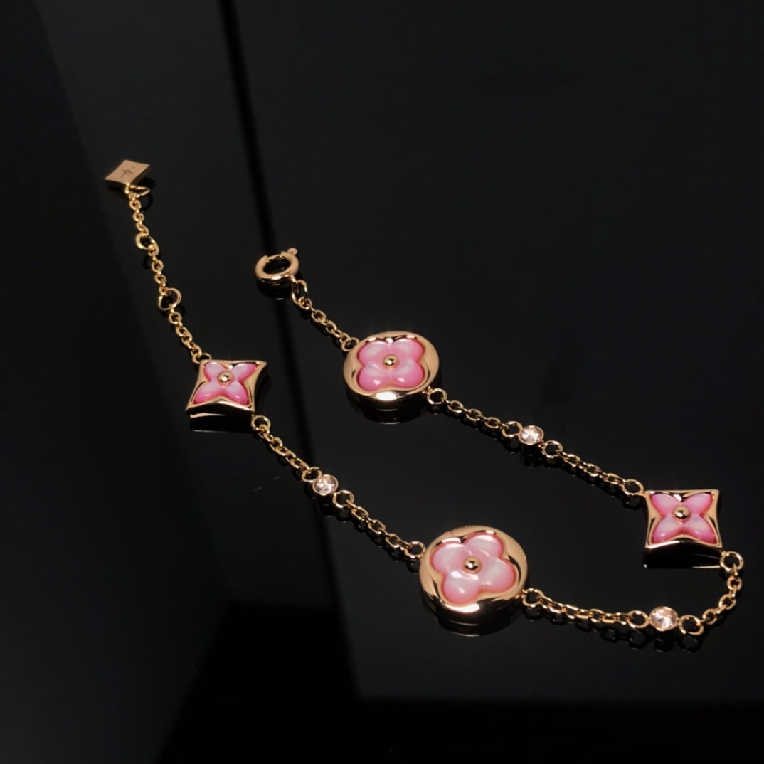 ¡®Lumi¡¯STAR AND SUN 4 MOTIF PINK MOP PINK GOLD BRACELET