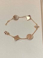 Lumi® Armband mit Stern und Sonne, 5 Motive, rosa-goldenes Armband