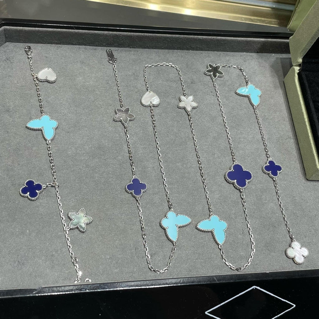 Lumi® GLÜCKSKLEE-HALSKETTE AUS SILBER MIT 11 MOTIVEN