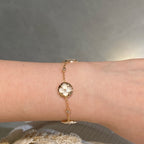 Lumi® Armband mit Stern und Sonne, 4 Motive, weiß, rosa, goldfarben 