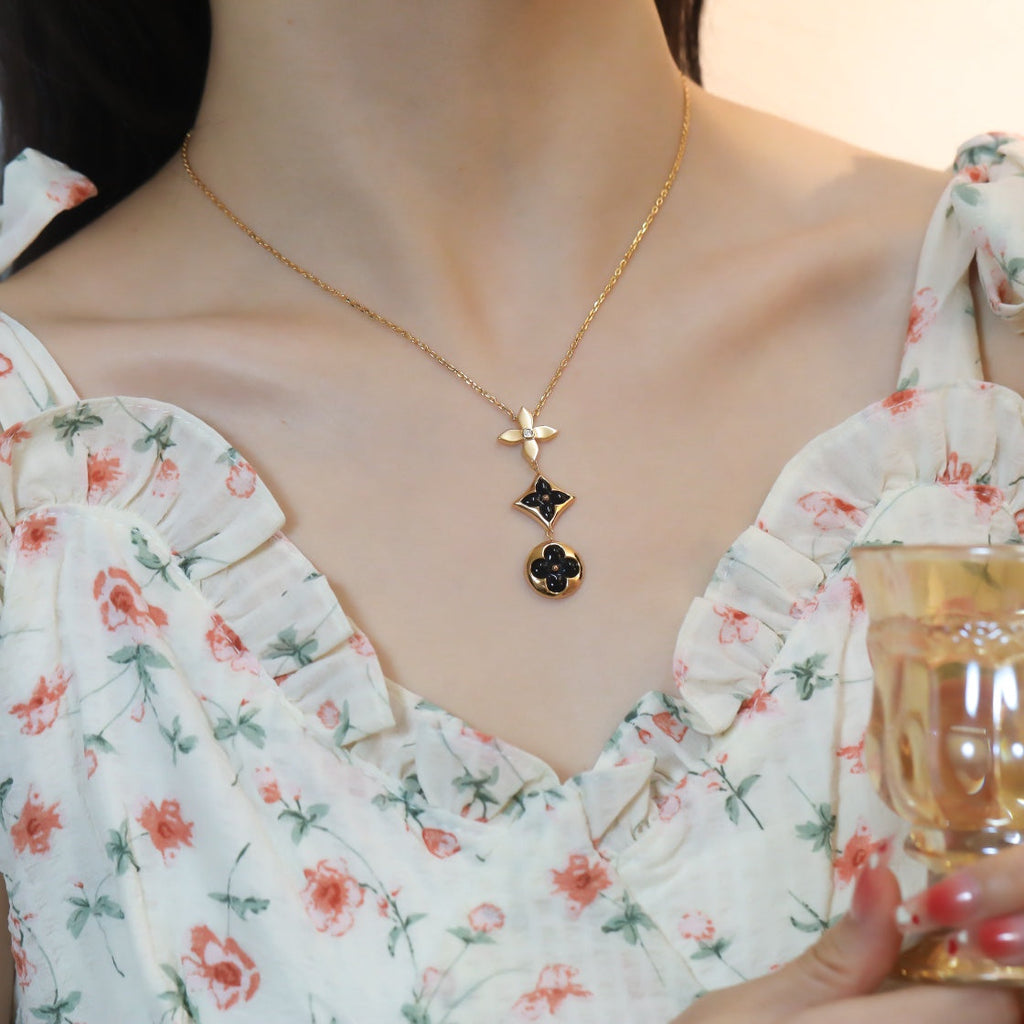 ¡®Lumi¡¯STAR AND SUN ONYX ROSA GOLD KETTE