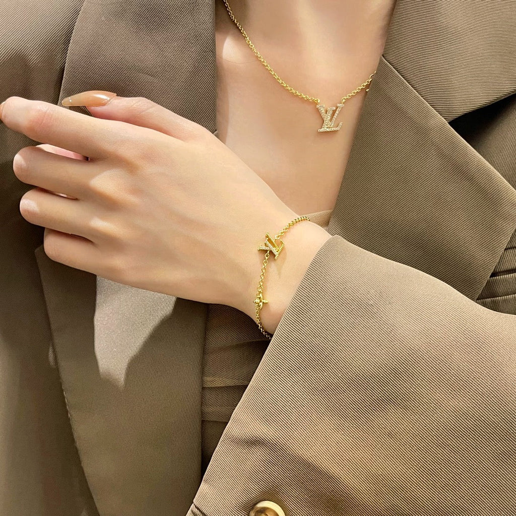 ®Lumi®LOGO STAR MOTIF GOLD ARMBAND