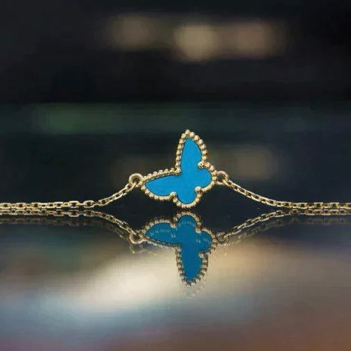 Lumi® Butterfly Türkisfarbenes Schmetterlingsarmband