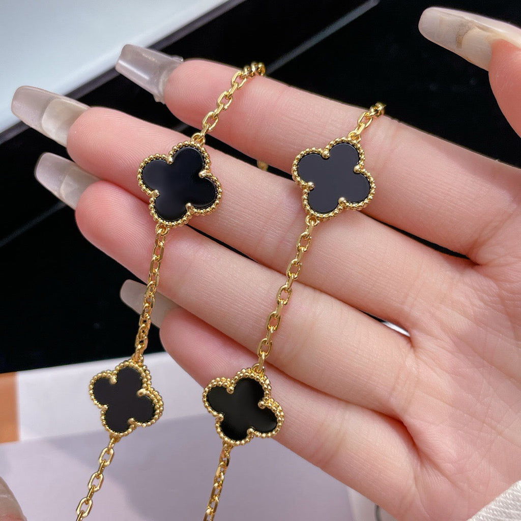Lumi® Kleeblatt-Halskette mit 10 Motiven aus Onyx