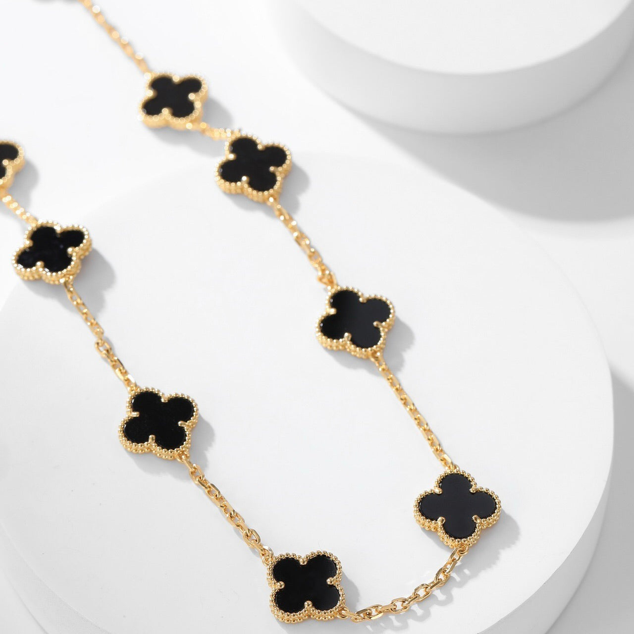 Lumi® Kleeblatt-Halskette mit 10 Motiven aus Onyx