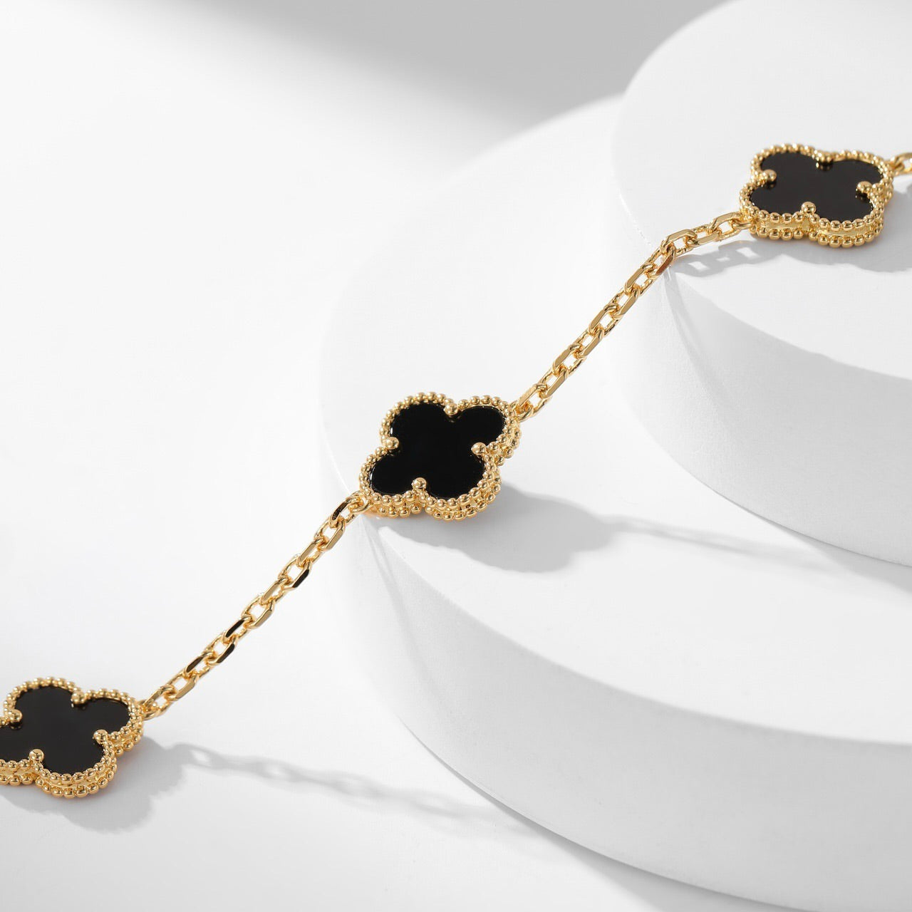 Lumi® Kleeblatt-Halskette mit 10 Motiven aus Onyx