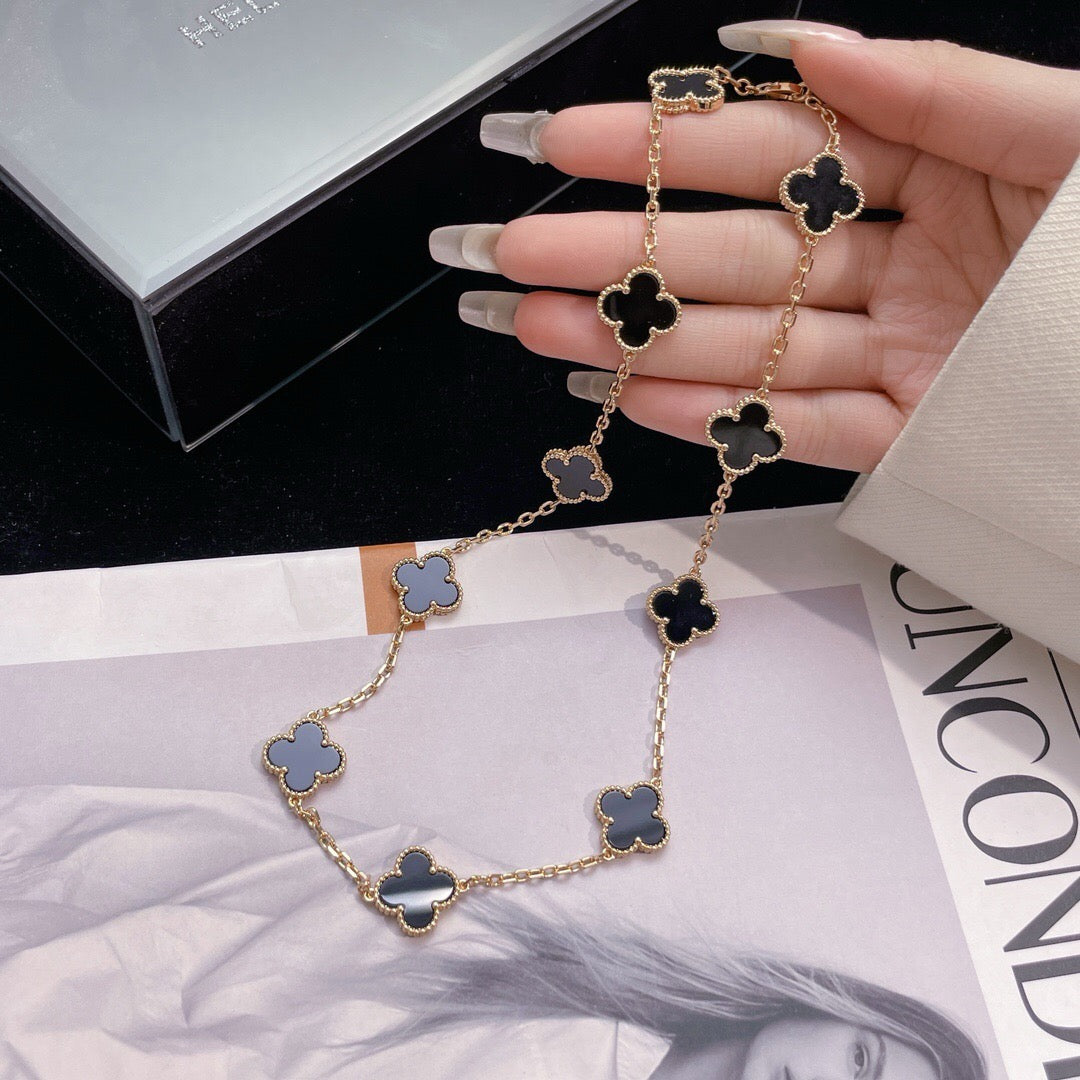 Lumi® Kleeblatt-Halskette mit 10 Motiven aus Onyx