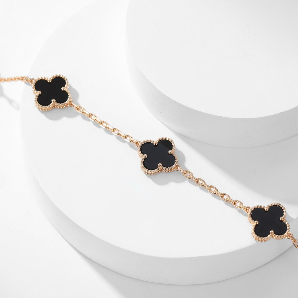 Lumi® Kleeblatt-Halskette mit 10 Motiven aus Onyx