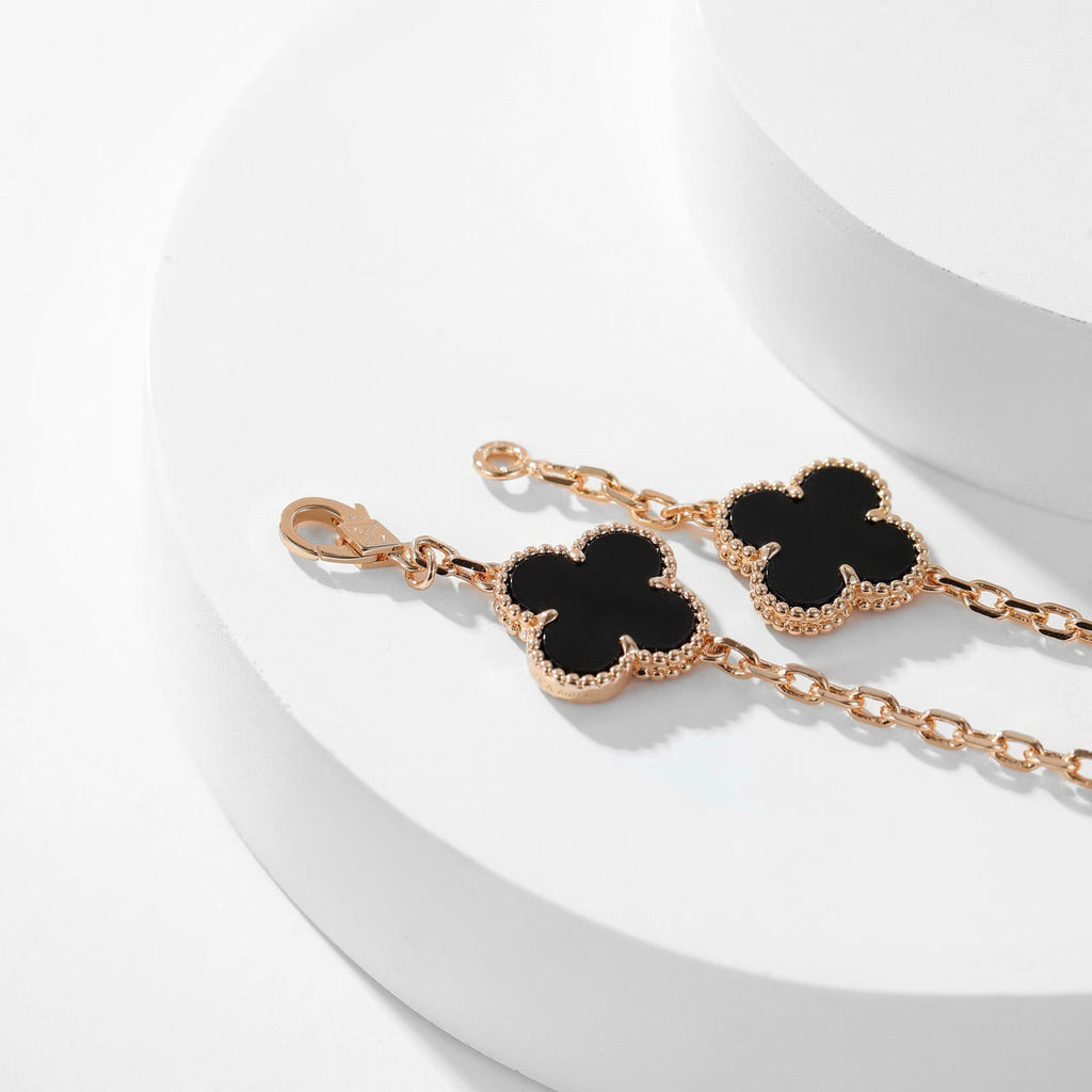 Lumi® Kleeblatt-Halskette mit 10 Motiven aus Onyx