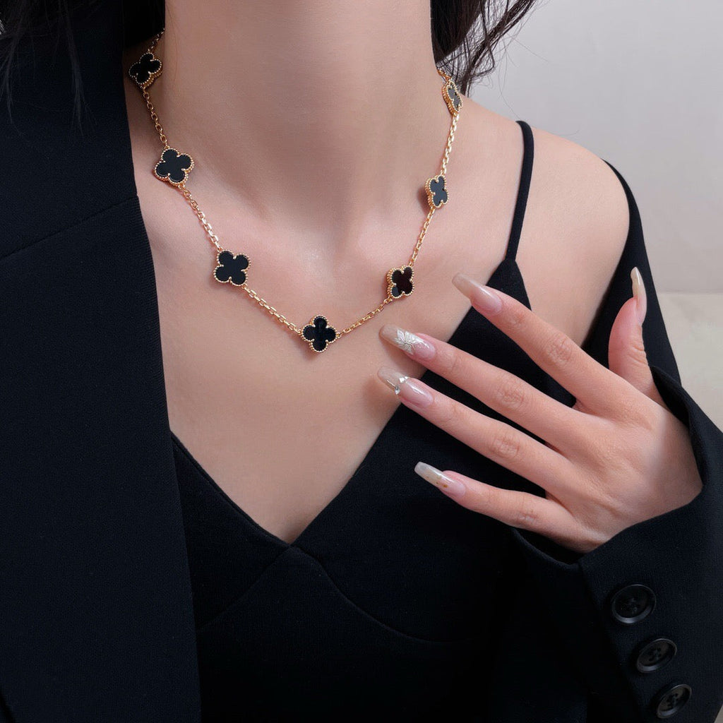 Lumi® Kleeblatt-Halskette mit 10 Motiven aus Onyx