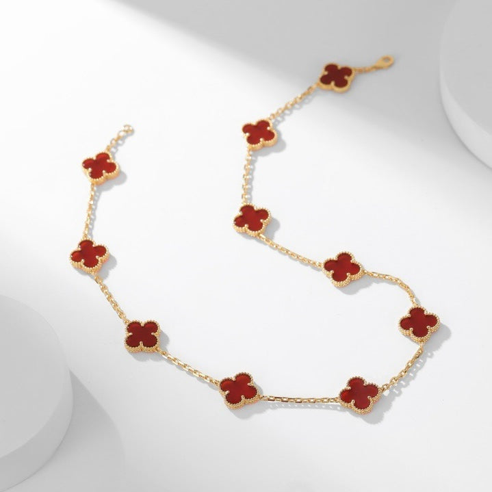 Lumi® Kleeblatt-Halskette mit 10 Motiven aus Karneol