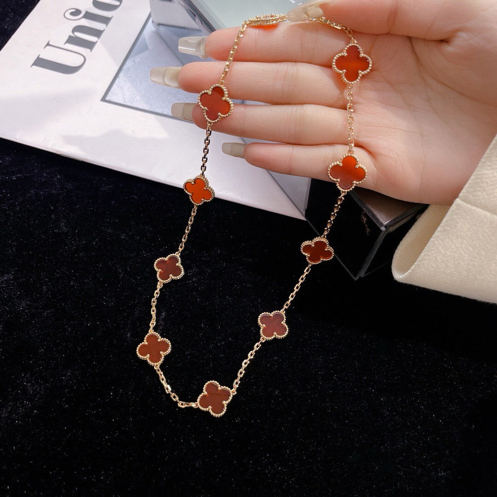 Lumi® Kleeblatt-Halskette mit 10 Motiven aus Karneol