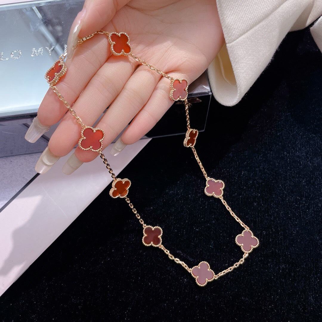 Lumi® Kleeblatt-Halskette mit 10 Motiven aus Karneol
