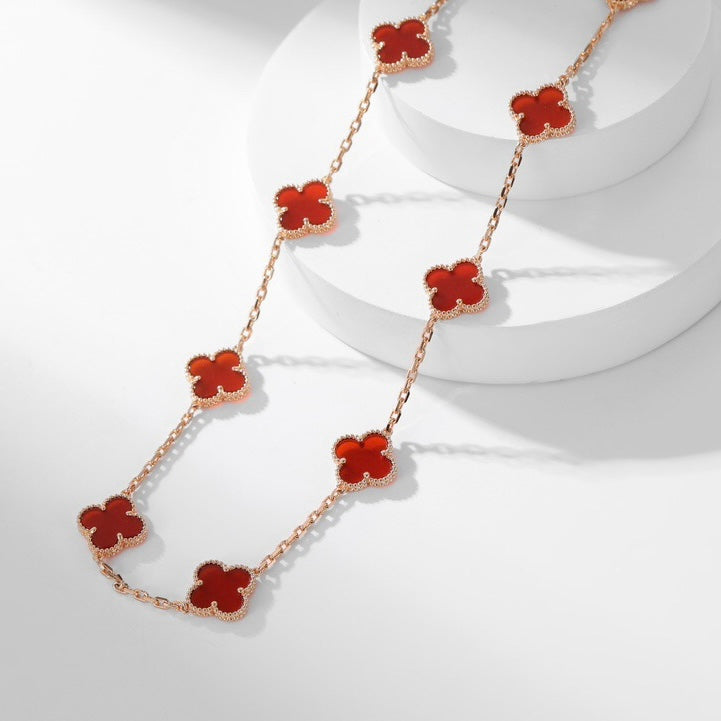 Lumi® Kleeblatt-Halskette mit 10 Motiven aus Karneol