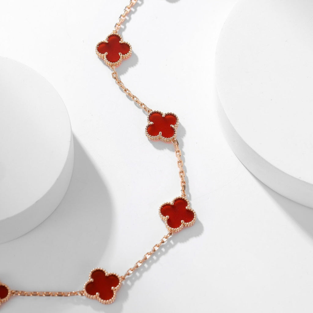 Lumi® Kleeblatt-Halskette mit 10 Motiven aus Karneol