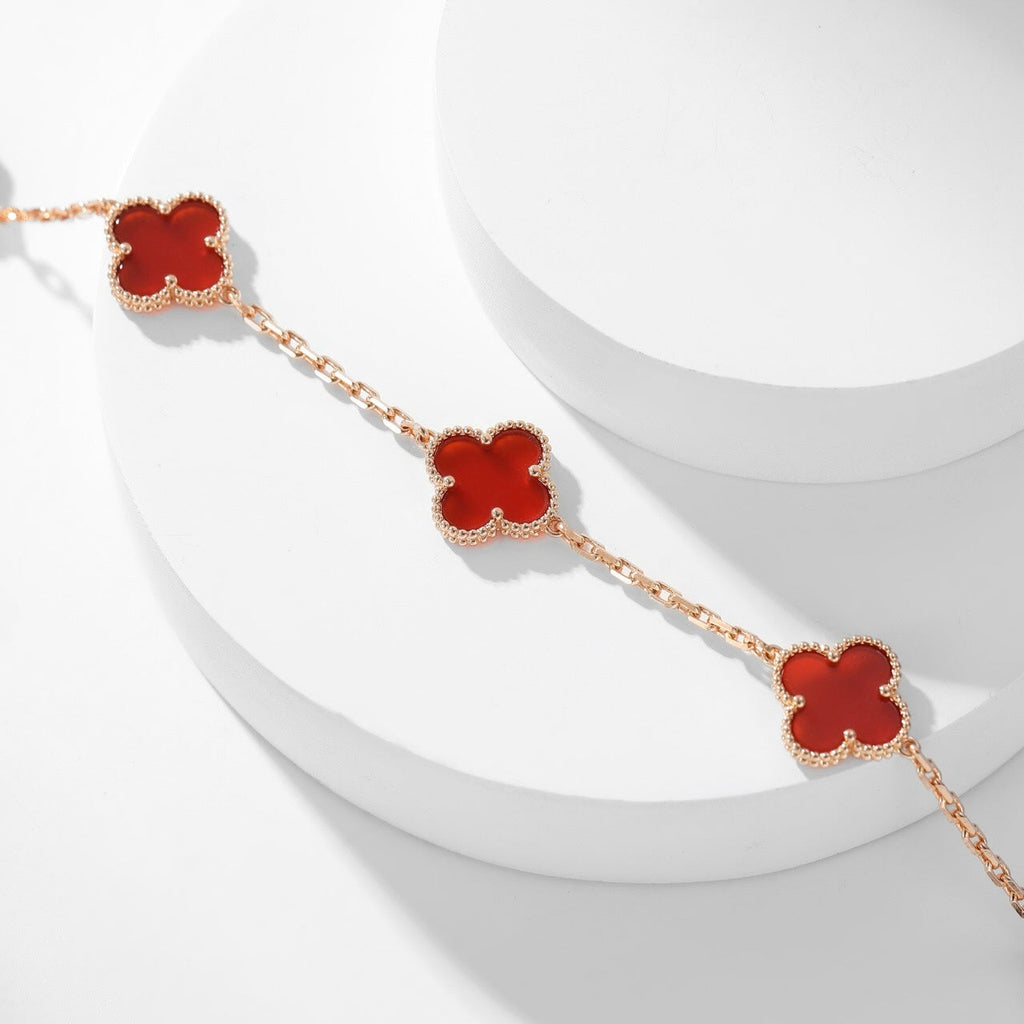 Lumi® Kleeblatt-Halskette mit 10 Motiven aus Karneol