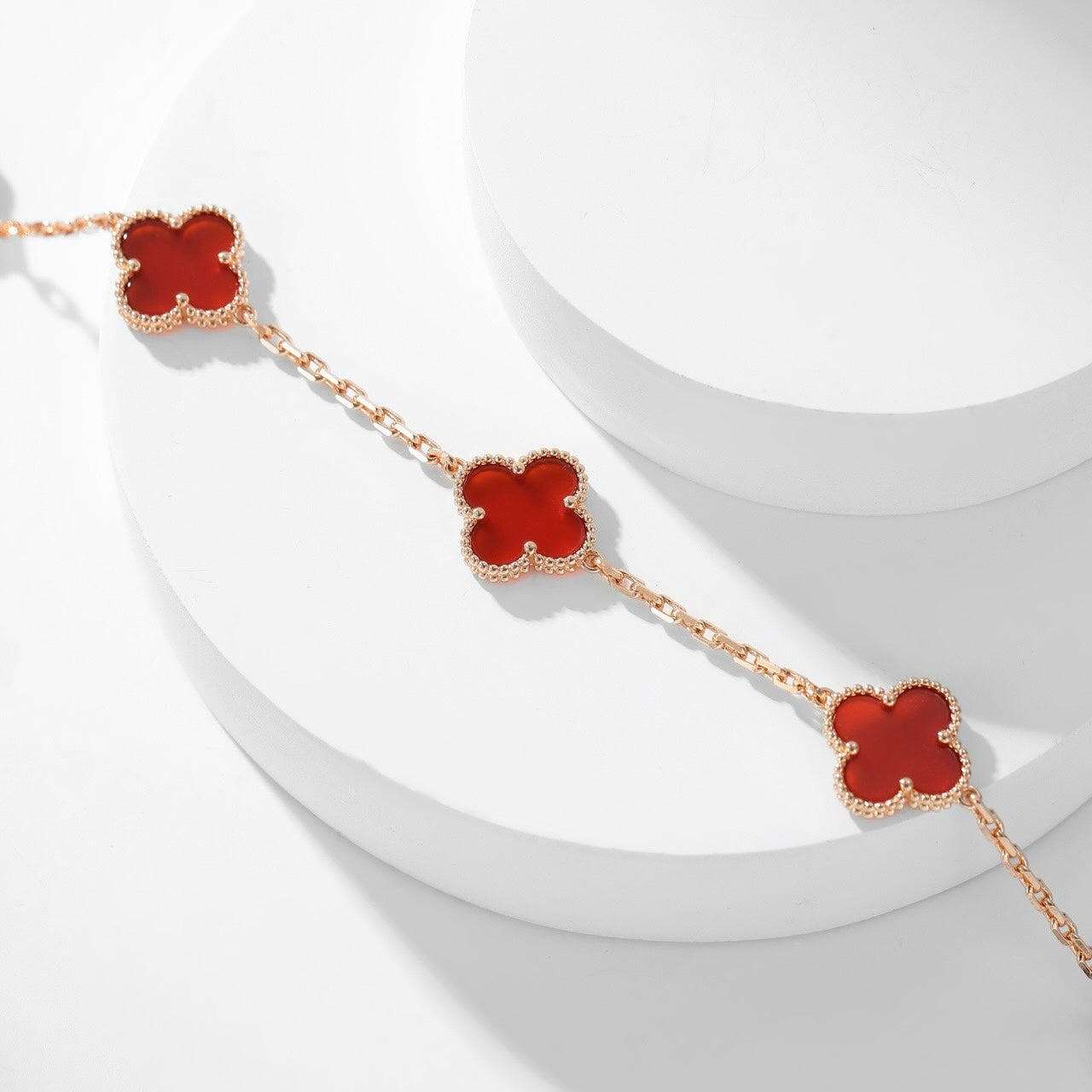 Lumi® Kleeblatt-Halskette mit 10 Motiven aus Karneol