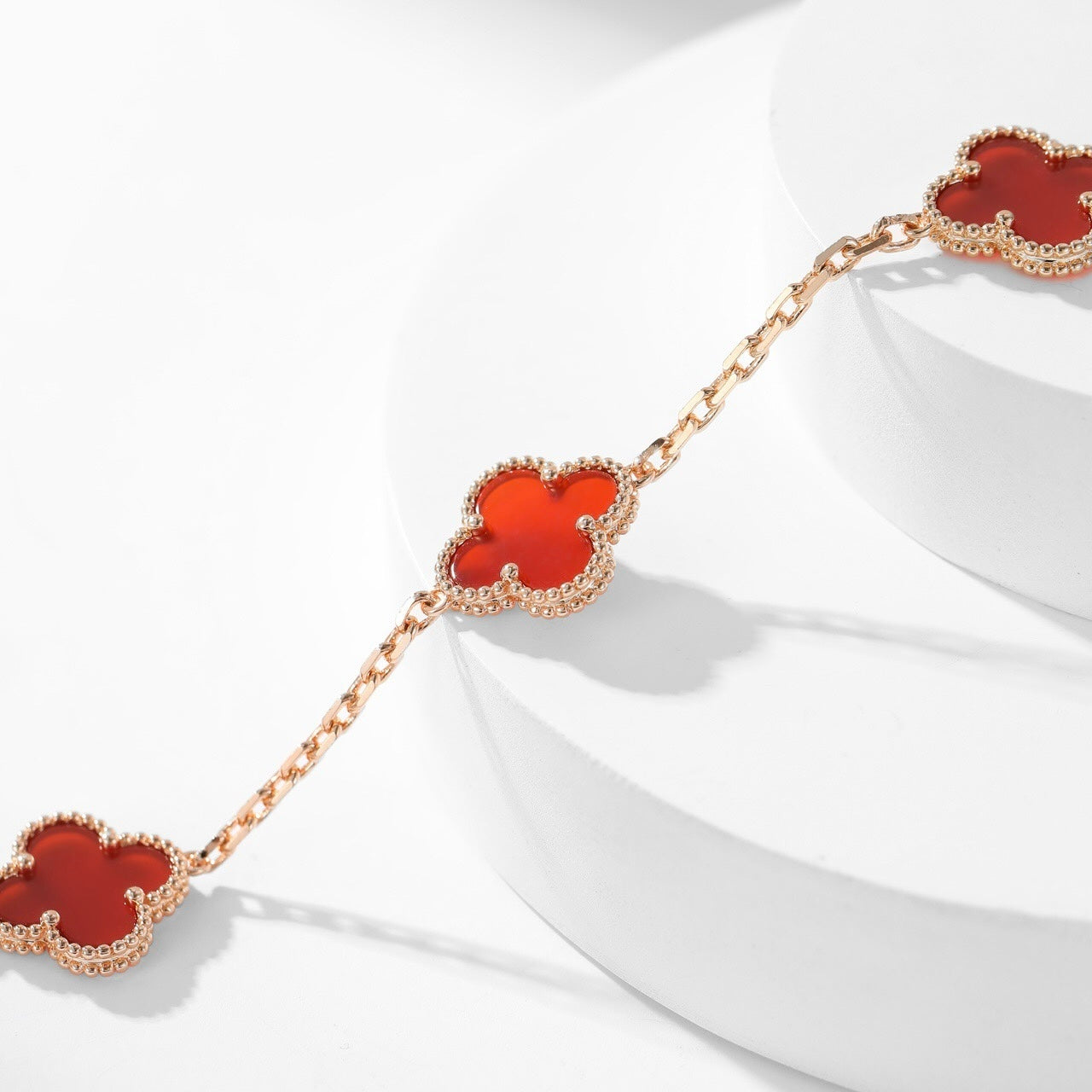 Lumi® Kleeblatt-Halskette mit 10 Motiven aus Karneol