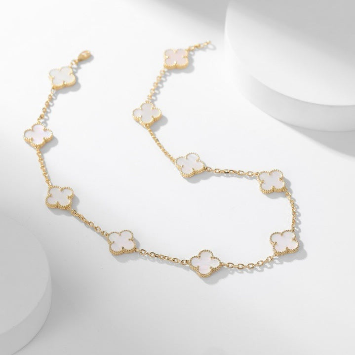 Lumi® Kleeblatt-Halskette mit 10 Motiven aus weißem Perlmutt