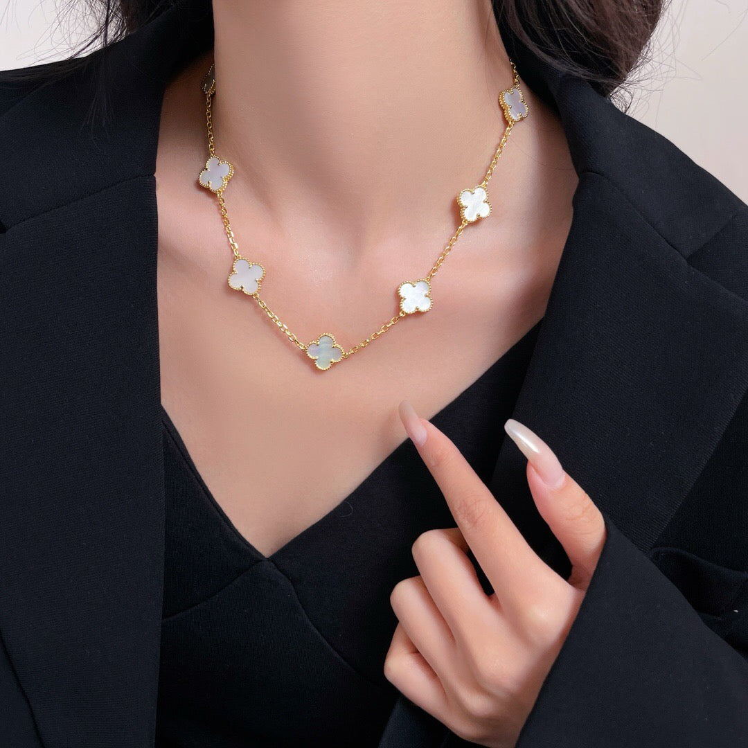 Lumi® Kleeblatt-Halskette mit 10 Motiven aus weißem Perlmutt