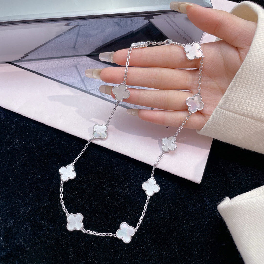 Lumi® Kleeblatt-Halskette mit 10 Motiven aus weißem Perlmutt