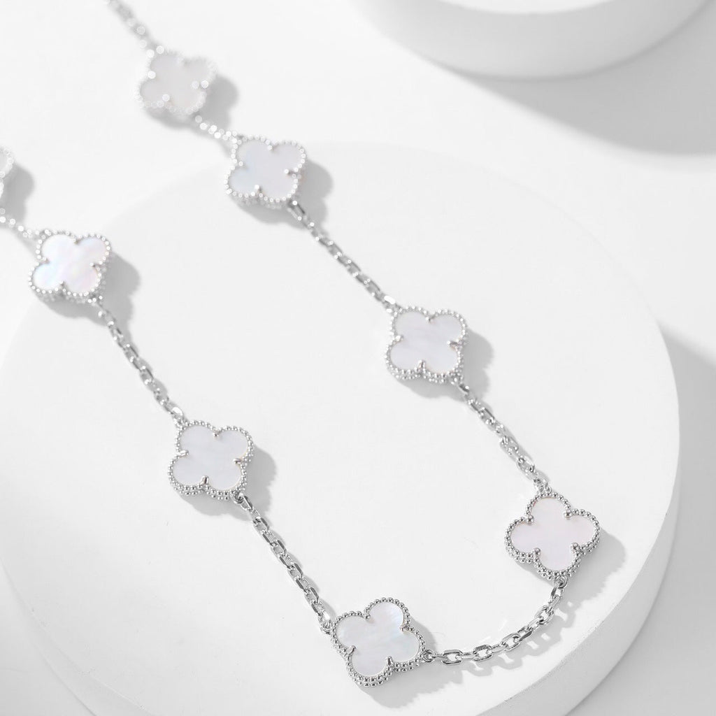 Lumi® Kleeblatt-Halskette mit 10 Motiven aus weißem Perlmutt