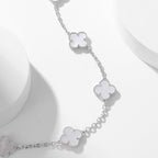 Lumi® Kleeblatt-Halskette mit 10 Motiven aus weißem Perlmutt