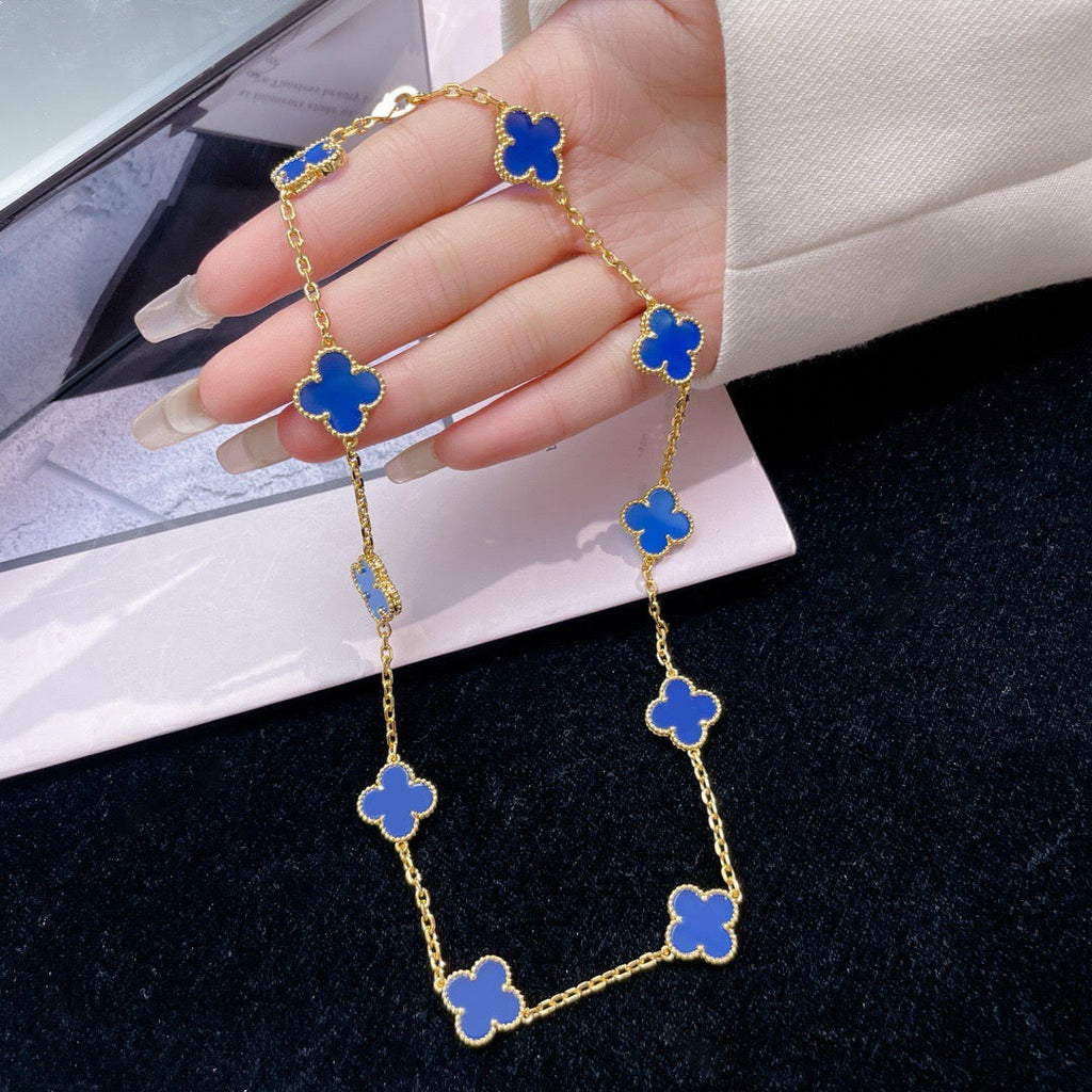 Lumi® Kleeblatt-Halskette mit 10 Motiven aus blauem Achat