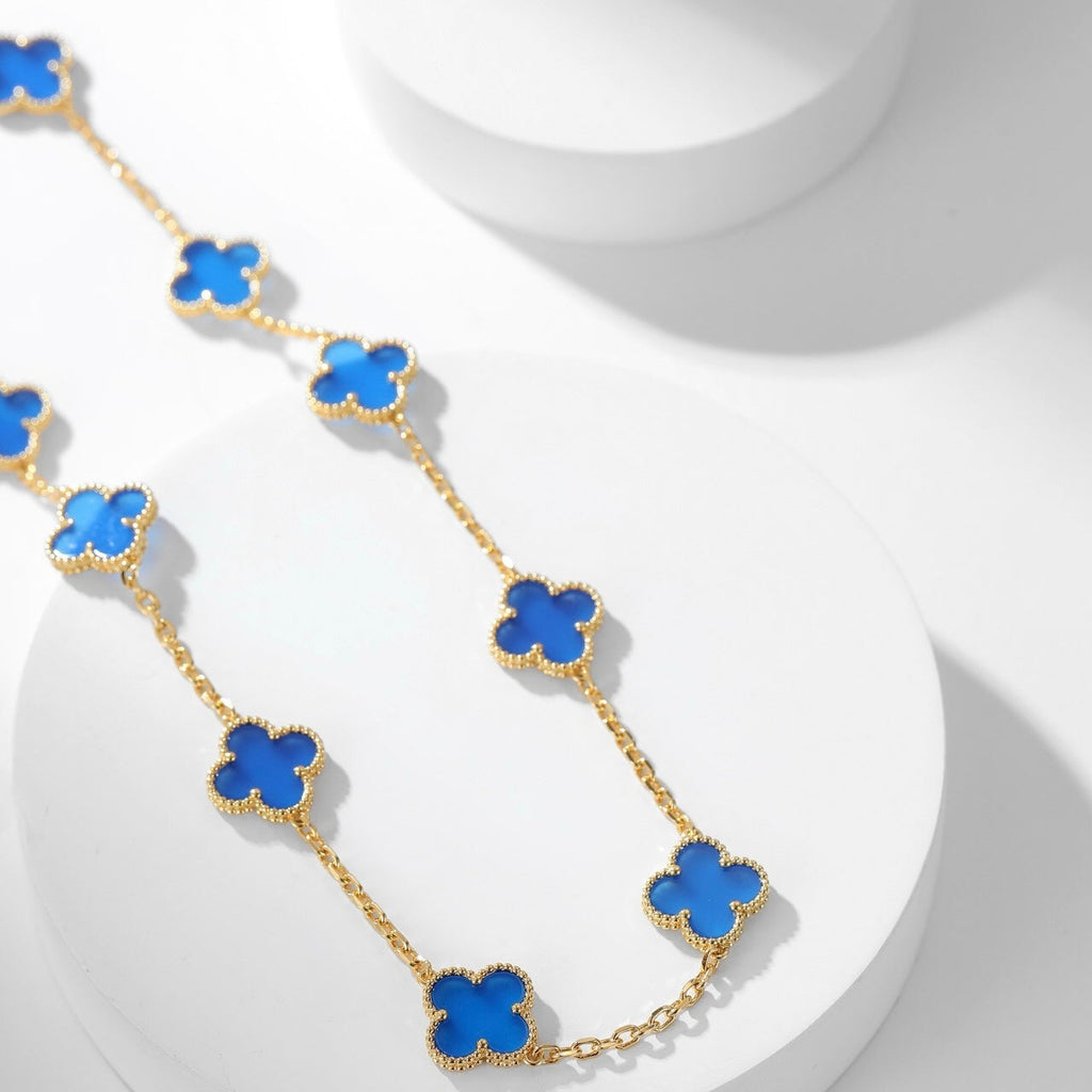 Lumi® Kleeblatt-Halskette mit 10 Motiven aus blauem Achat