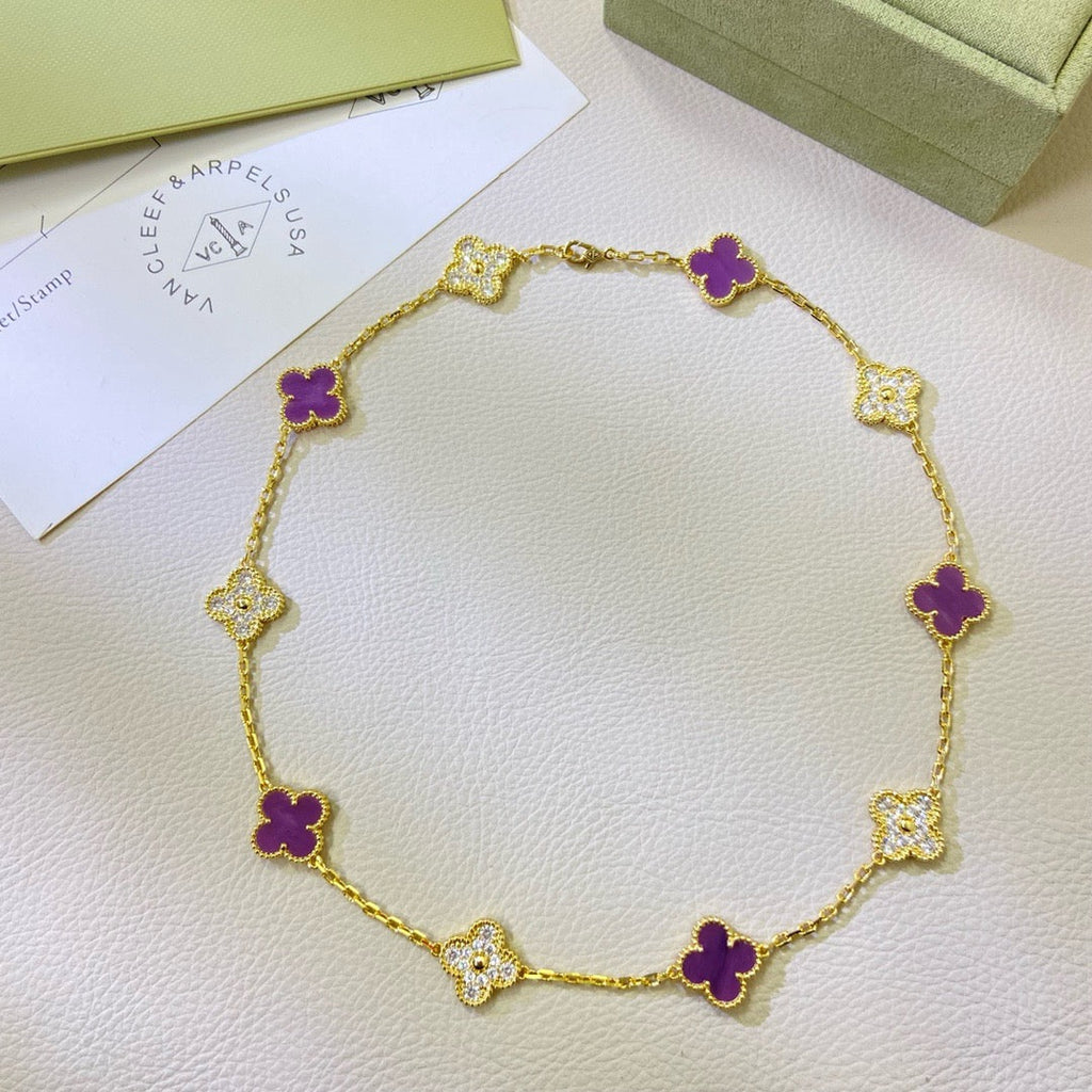Lumi® Kleeblatt-Halskette mit 10 Motiven, lila-violett, mit Diamanten