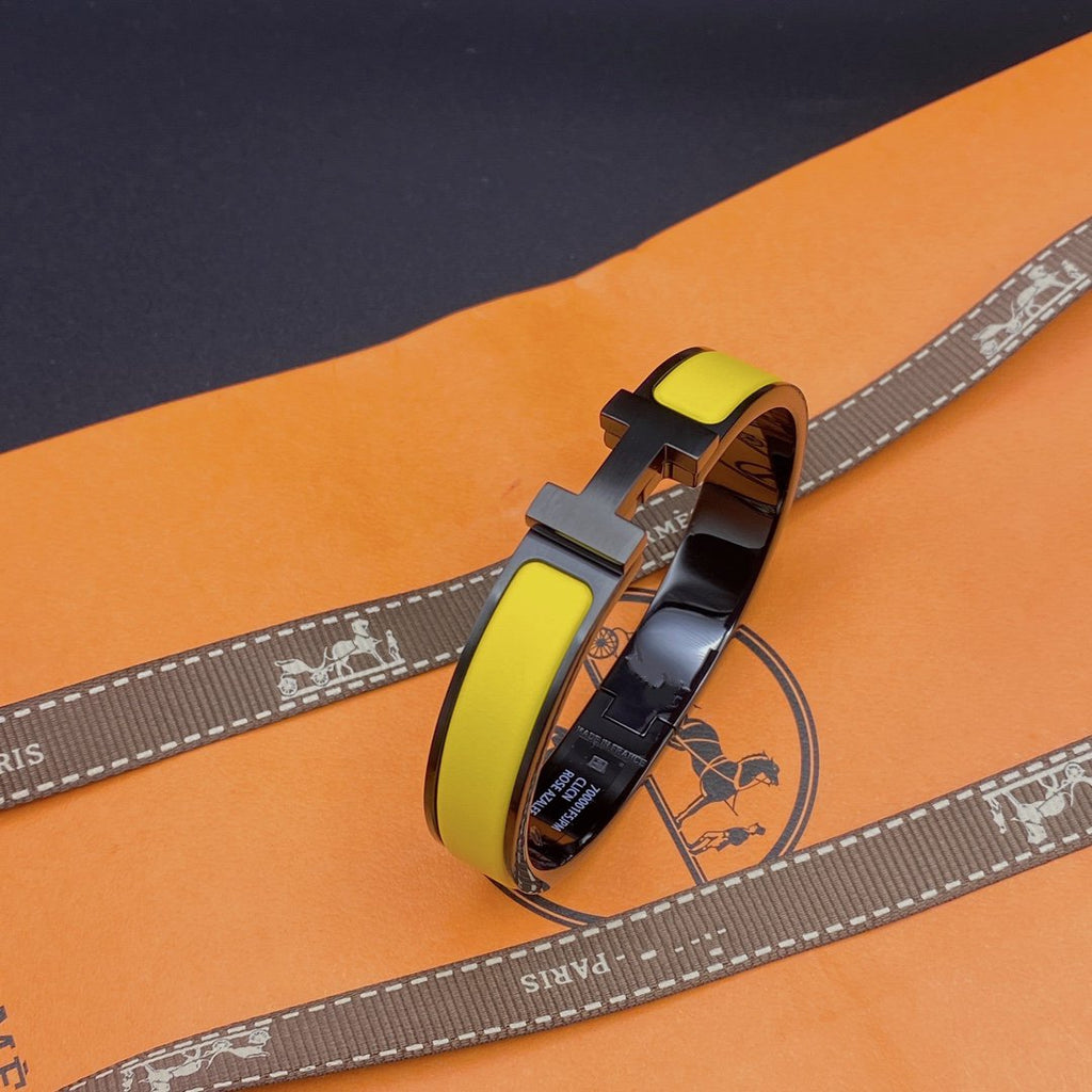LumiCLIC HM SO SCHWARZ-GELBES ARMBAND