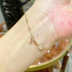 ¡®Lumi¡¯Armbänder mit Mopp-Effekt, rosa-goldenen Diamanten