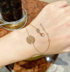 ¡®Lumi¡¯Armbänder mit Mopp-Effekt, rosa-goldenen Diamanten