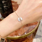 ¡®Lumi¡¯Armbänder mit Mopp-Effekt, rosa-goldenen Diamanten